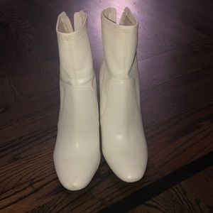 White booties by Aldo